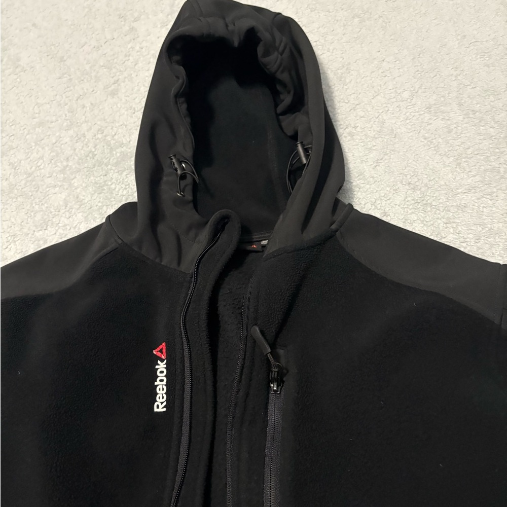 Reebok sweater/jacket, blk, size l. Like new condition.